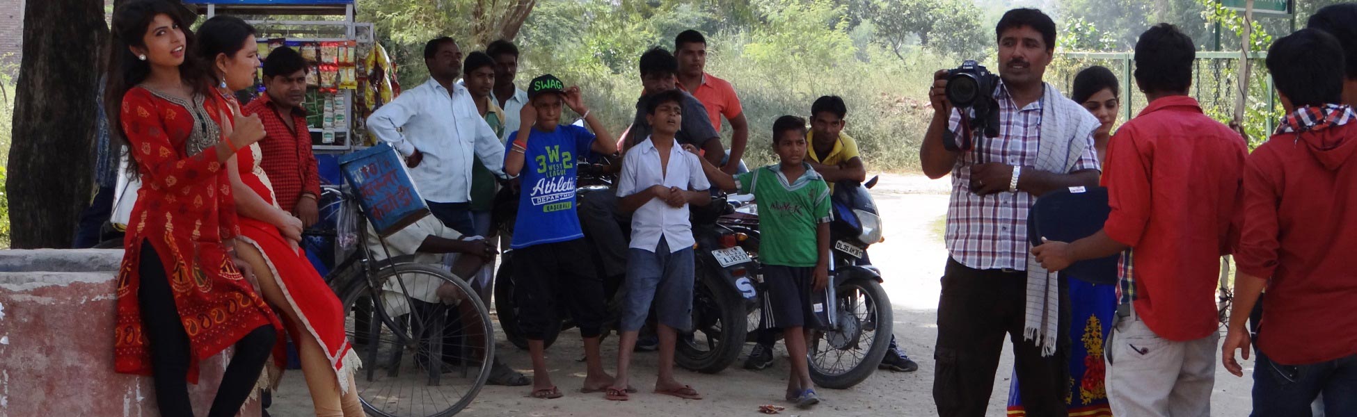 A film crew filming a scene about social awareness in Ghaziabad, Uttar Pradesh, with local onlookers watching the production process. fixer in Bankura, film fixer in Bankura, media fixer in Bankura, movie fixer in Bankura, production fixer in Bankura, line producer in Bankura