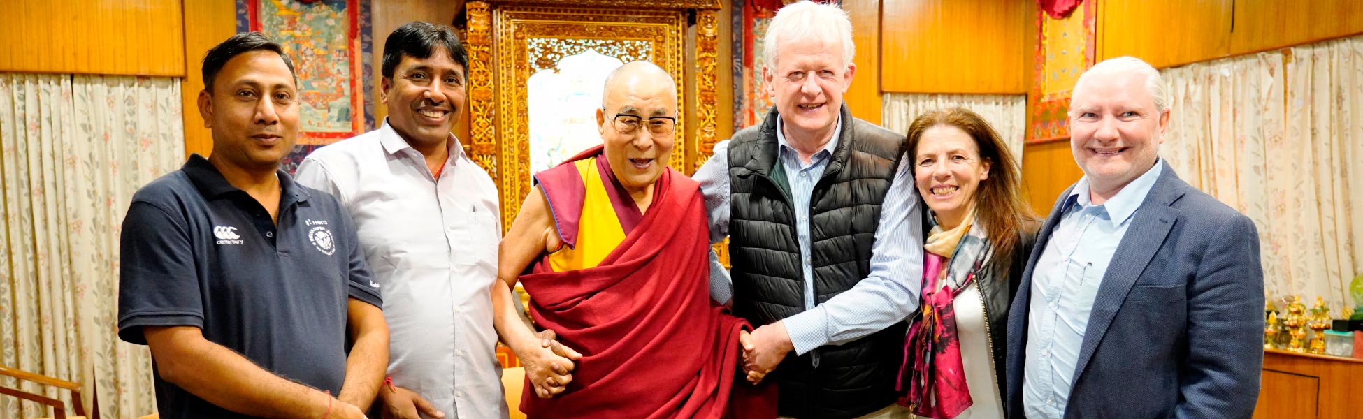 Trisna Films® crew alongside an international Irish production team and His Holiness the Dalai Lama. Captured during on-location filming for the David Bohm biographical documentary in Dharamshala, Kangra, Himachal Pradesh, India. film shooting locations in india, video shooting locations in india, tv shooting locations in india, shooting locations in india, shooting locations, film shooting locations, video shooting locations, tv shooting locations