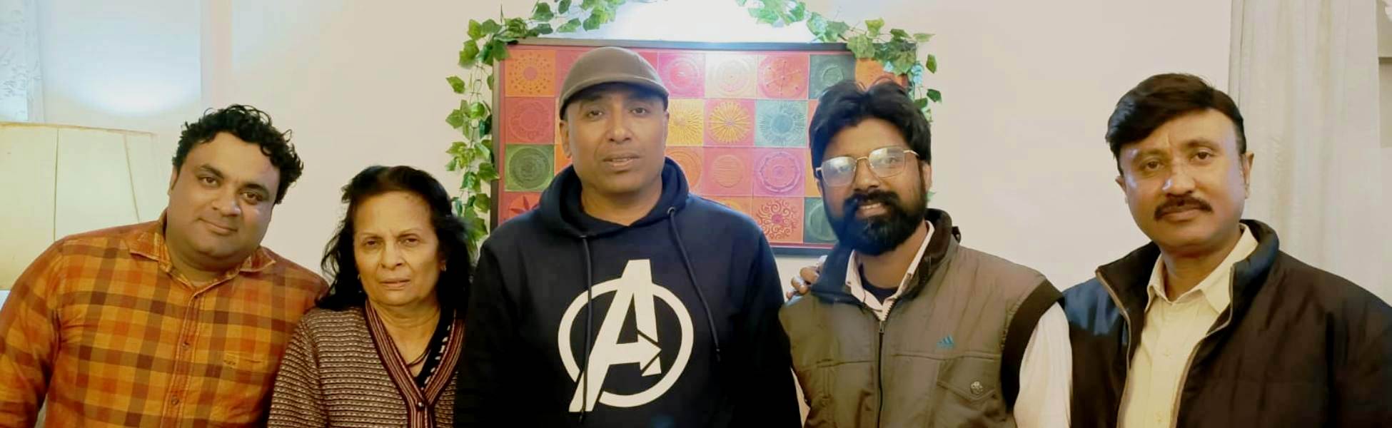 The Trisna Films® cast and crew posing together indoors during the production of a short film in New Delhi, India, featuring Director Avinash Kumar in a blue Avengers hoodie. fixer in Kolkata, film fixer in Kolkata, production fixer in Kolkata, line producer in Kolkata