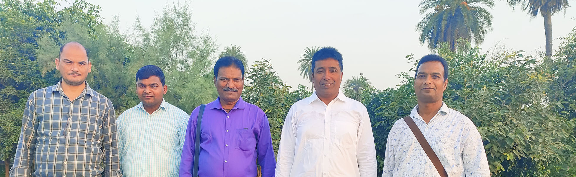 Five male members of the Trisna Films® multi-camera crew standing outdoors in front of trees during a sports documentary production in Faridabad. filmmaking workshop in india, filmmaking workshop in maharashtra, filmmaking workshop in pune, cinematography workshop in india, cinematography workshop in maharashtra, cinematography workshop in pune, camera workshop in india, camera workshop in maharashtra, camera workshop in pune, editing workshop in india, editing workshop in maharashtra, editing workshop in pune, vfx workshop in india, vfx workshop in maharashtra, vfx workshop in pune, animation workshop in india, animation workshop in maharashtra, animation workshop in pune, photography workshop in india, photography workshop in maharashtra, photography workshop in pune, direction workshop in india, direction workshop in maharashtra, direction workshop in pune, script writing workshop in india, script writing workshop in maharashtra, script writing workshop in pune