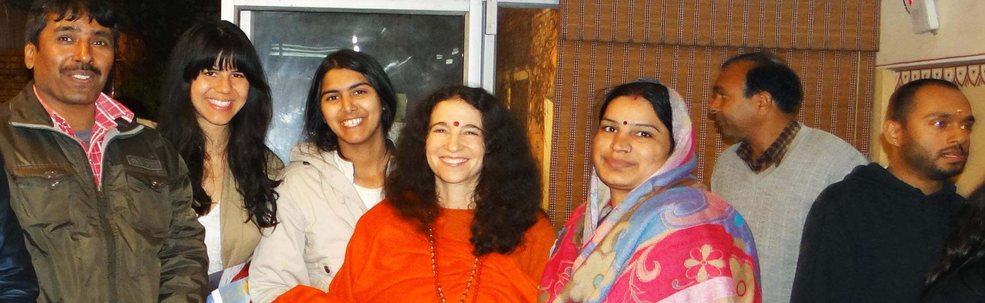 Trisna Films® production crew and US clients posing with renowned motivational speaker Sadhvi Bhagawati Saraswati during the filming of the 'Eight Limbs' yoga documentary in Rishikesh, Uttarakhand, India. filmmaking workshop in india, filmmaking workshop in delhi, filmmaking workshop in mumbai, filmmaking workshop in pune, filmmaking workshop in sonipat, filmmaking workshop in begusarai, cinematography workshop in india, cinematography workshop in delhi, cinematography workshop in mumbai, cinematography workshop in pune, cinematography workshop in sonipat, cinematography workshop in begusarai, camera workshop in india, camera workshop in delhi, camera workshop in mumbai, camera workshop in pune, camera workshop in sonipat, camera workshop in begusarai, editing workshop in india, editing workshop in delhi, editing workshop in mumbai, editing workshop in pune, editing workshop in sonipat, editing workshop in begusarai, vfx workshop in india, vfx workshop in Delhi, vfx workshop in mumbai, vfx workshop in pune, vfx workshop in sonipat, vfx workshop in begusarai, animation workshop in india, animation workshop in Delhi, animation workshop in mumbai, animation workshop in pune, animation workshop in sonipat, animation workshop in begusarai, photography workshop in india, photography workshop in delhi, photography workshop in mumbai, photography workshop in pune, photography workshop in sonipat, photography workshop in begusarai, direction workshop in india, direction workshop in delhi, direction workshop in mumbai, direction workshop in pune, direction workshop in sonipat, direction workshop in begusarai, script writing workshop in india, script writing workshop in delhi, script writing workshop in mumbai, script writing workshop in pune, script writing workshop in sonipat, script writing workshop in begusarai
