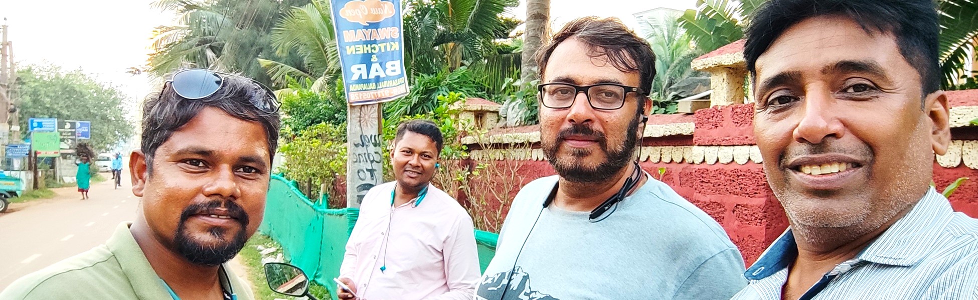 Five members of the Trisna Films Odisha team standing outdoors in a lush garden area during a short film production in Puri, India. film shooting locations in pune, video shooting locations in pune, tv shooting locations in pune, shooting locations in pune