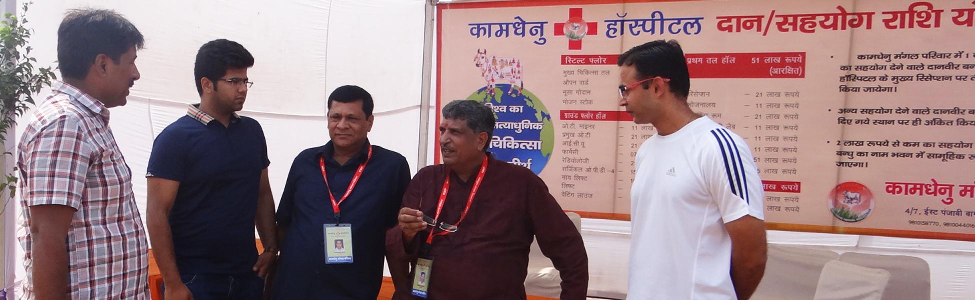 Professional camera crew from Trisna Films® documenting the foundation laying ceremony of Kamdhenu Hospital by Kamdhenu Mangal Parivar in Bahadurgarh, Haryana. The image captures the on-location documentary production process for a healthcare and social welfare project in North India. film pre production house in india, film pre production house in Delhi, film pre production house in mumbai, film pre production house in pune, film pre production house in sonipat, film pre production house in begusarai, video pre production house in india, video pre production house in Delhi, video pre production house in mumbai, video pre production house in pune, video pre production house in sonipat, video pre production house in begusarai, tv pre production house in india, tv pre production house in delhi, tv pre production house in mumbai, tv pre production house in pune, tv pre production house in sonipat, tv pre production house in begusarai, pre production house in india, pre production house in delhi, pre production house in mumbai, pre production house in pune, pre production house in sonipat, pre production house in begusarai, film pre production company in india, film pre production company in delhi, film pre production company in mumbai, film pre production company in pune, film pre production company in sonipat, film pre production company in begusarai, video pre production company in india, video pre production company in delhi, video pre production company in mumbai, video pre production company in pune, video pre production company in sonipat, video pre production company in begusarai, tv pre production company in india, tv pre production company in delhi, tv pre production company in mumbai, tv pre production company in pune, tv pre production company in sonipat, tv pre production company in begusarai, pre production company in india, pre production company in delhi, pre production company in mumbai, pre production company in pune, pre production company in sonipat, pre production company in begusarai