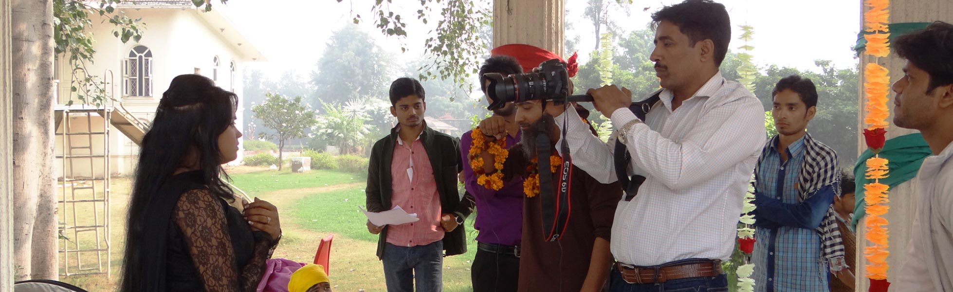 A professional film crew from Trisna Films® filming a scene for the short film 'Andhvishwas' using a Canon DSLR on an outdoor set in New Delhi, India. film shooting locations in Ayodhya, video shooting locations in Ayodhya, tv shooting locations in Ayodhya, shooting locations in Ayodhya